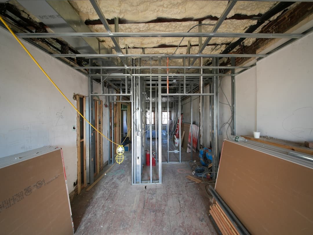 electrician installing wires in new house