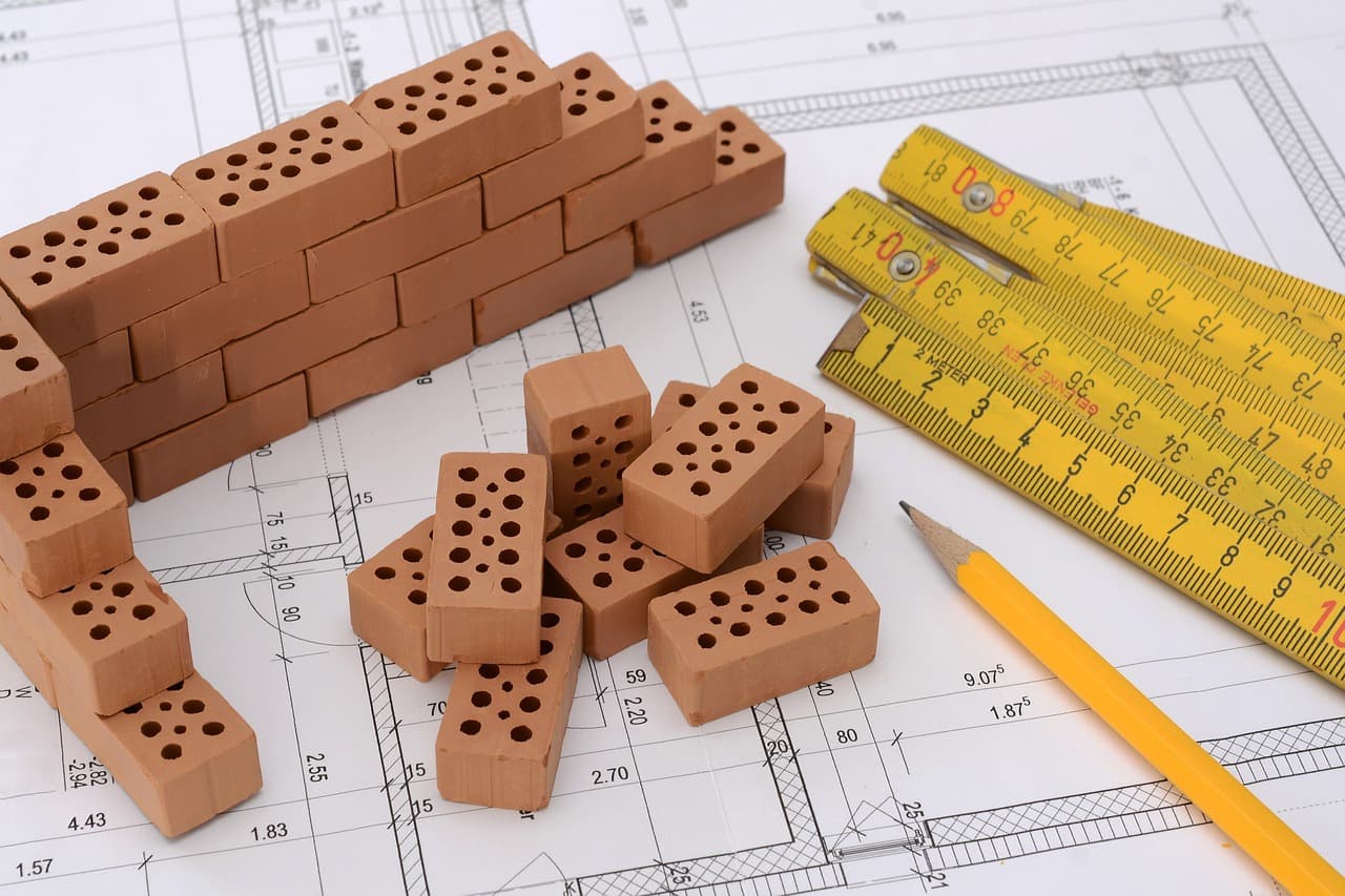 architect reviewing blueprints