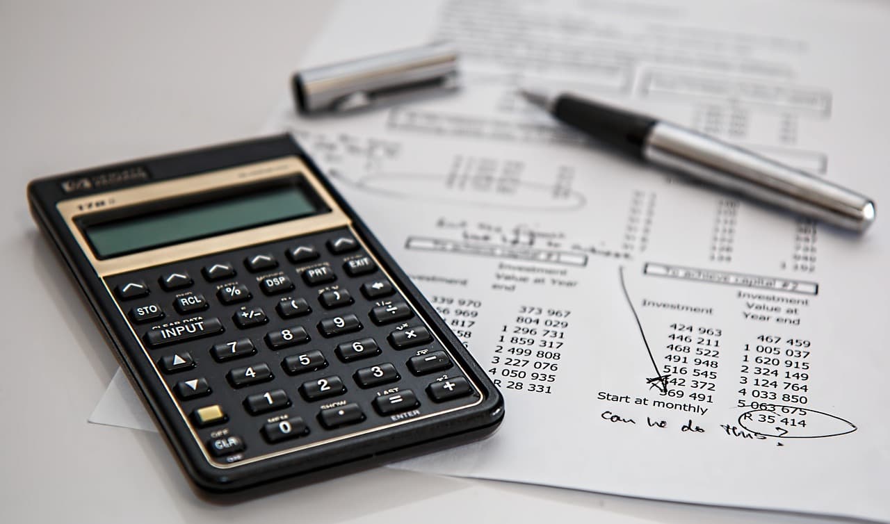 calculator and house model