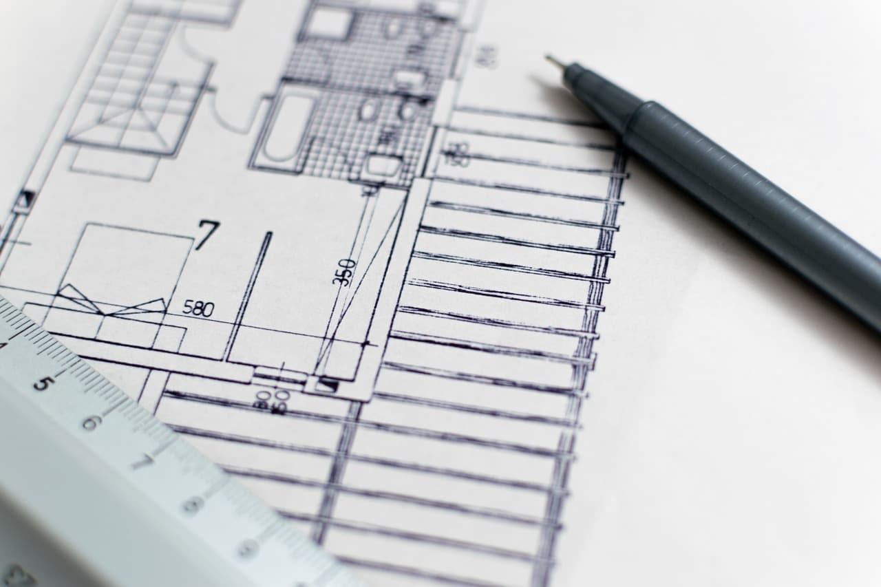 architect drawing renovation plans