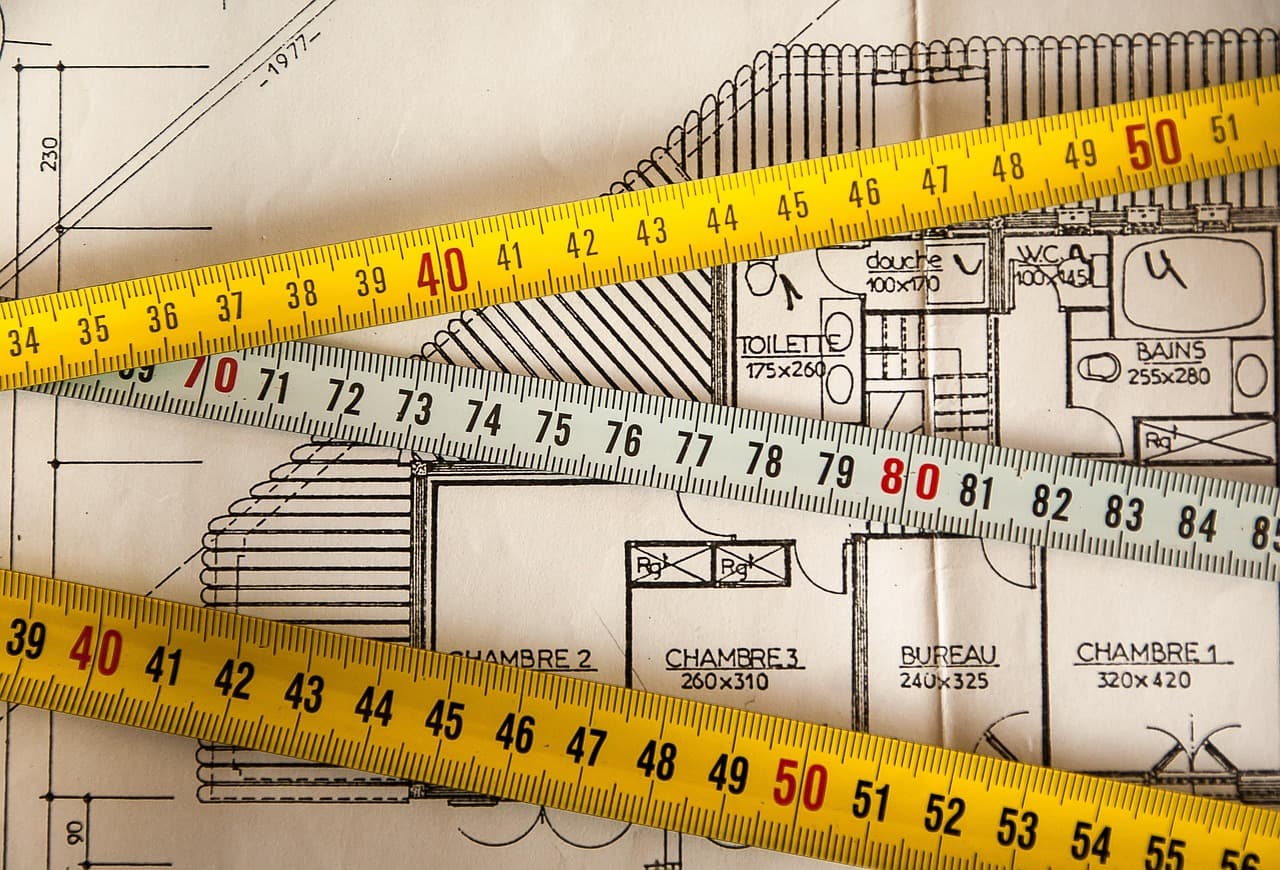 architect and contractor reviewing plans
