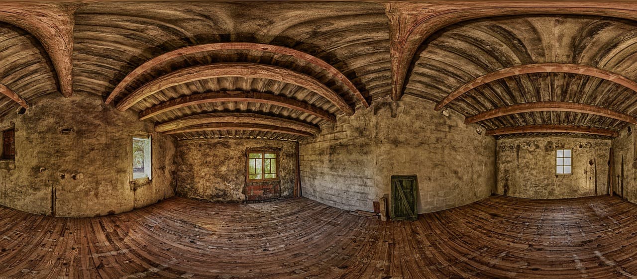 empty attic with exposed beams